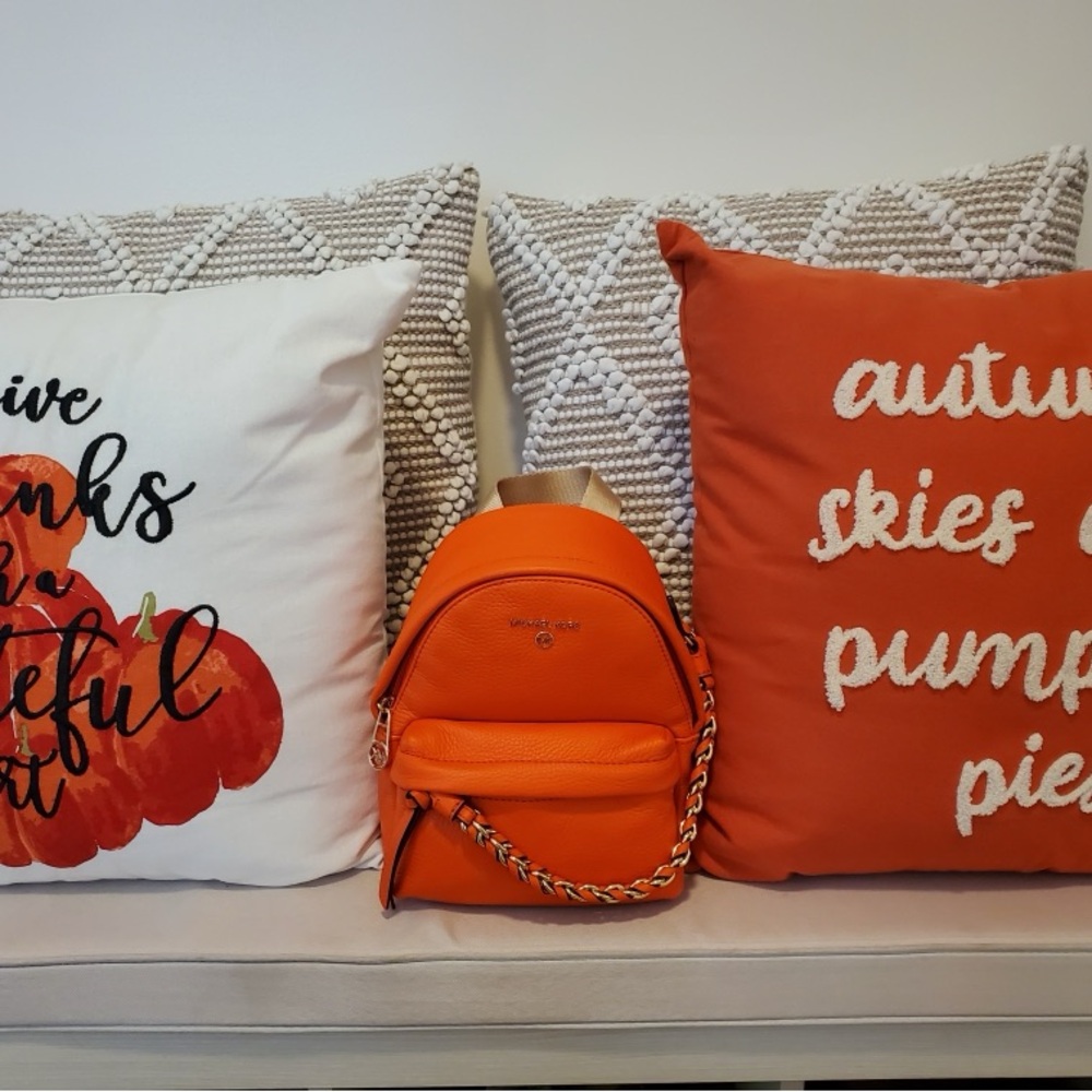 Michael Kors leather clementine orange mini backpack